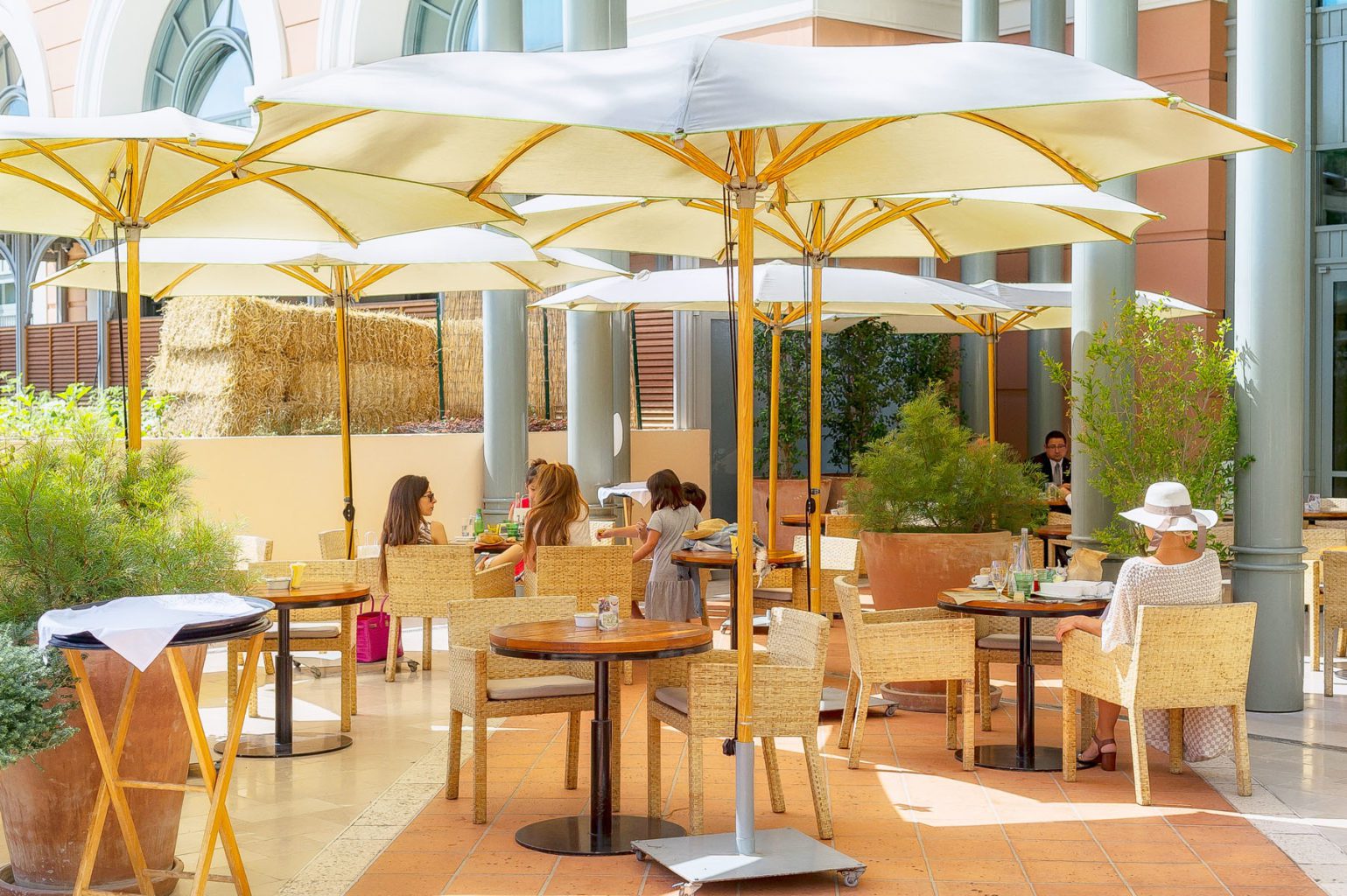 small restaurant umbrellas bay poggesi