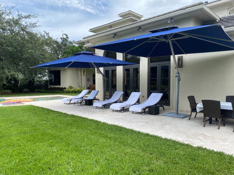 Spend The Day Poolside Under An Umbrella